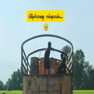 A group of people boarded a car with a group of people sitting on the beach